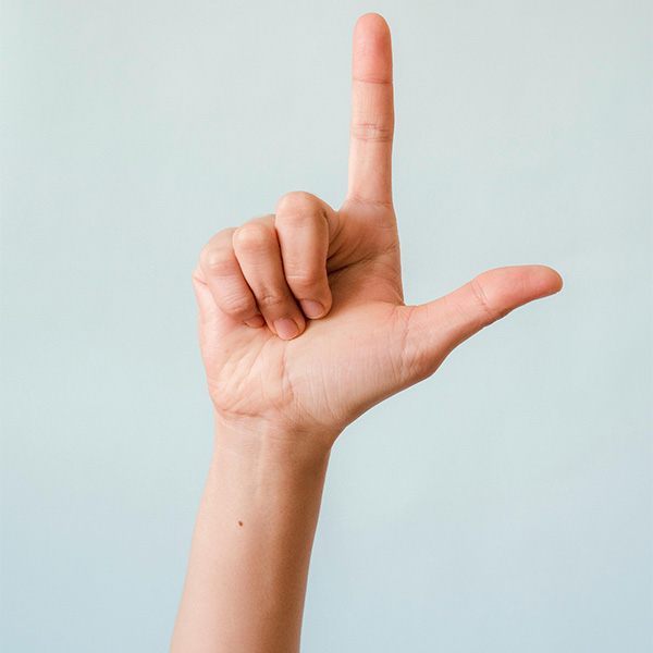 Hand with finger pointing upwards.