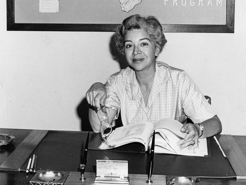 Photo of Estellene Walker at her desk.