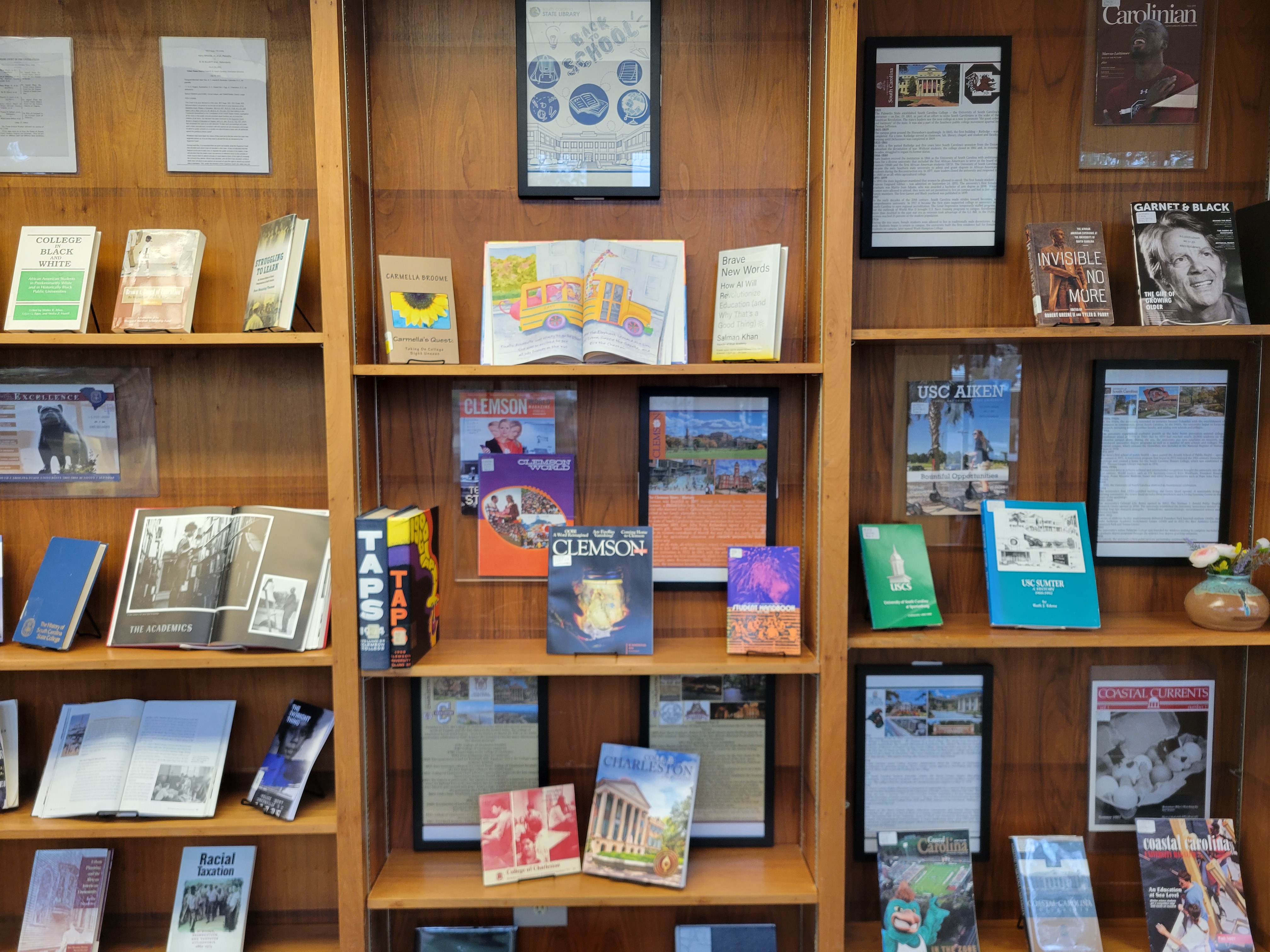 State Library shelves documenting the history of select South Carolina state universities