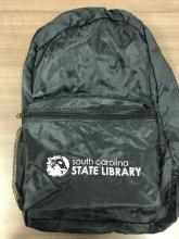 image of black backpack with state library logo
